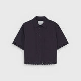 JONES + CO black cotton poplin short sleeve shirt with embroidered scalloped hem and chest pocket