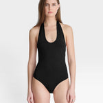 JONES + CO black halter neck bodysuit with a scoop neckline, a modern wardrobe essential.