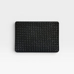 JONES + CO black leather Lia laptop case with handwoven carré detail on one side.