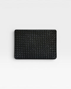JONES + CO black leather Lia laptop case with handwoven carré detail on one side.