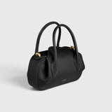 JONES + CO Oyster mini duffle bag in black pebble grained leather with gold-tone hardware and structured top handles.