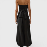JONES + CO black linen strapless Alzira top featuring a shirred back panel and a wide tie waist detail