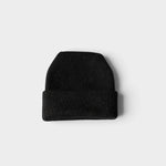 JONES + CO black oversized beanie made from a soft hand-loomed wool-alpaca blend for winter streetwear.