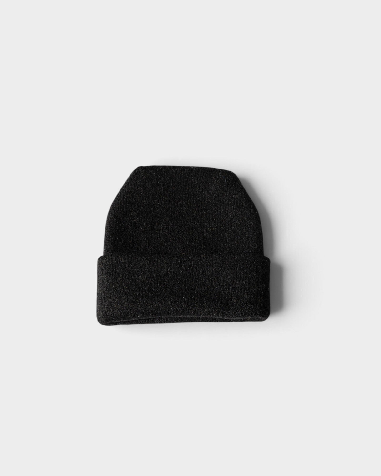 JONES + CO black oversized beanie made from a soft hand-loomed wool-alpaca blend for winter streetwear.