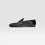 JONES + CO Sydney black crinkle patent leather penny loafer with ruched toe detail in a side profile view.
