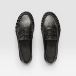 JONES + CO Sydney black crinkle patent leather penny loafers with ruched detailing, top-down view.