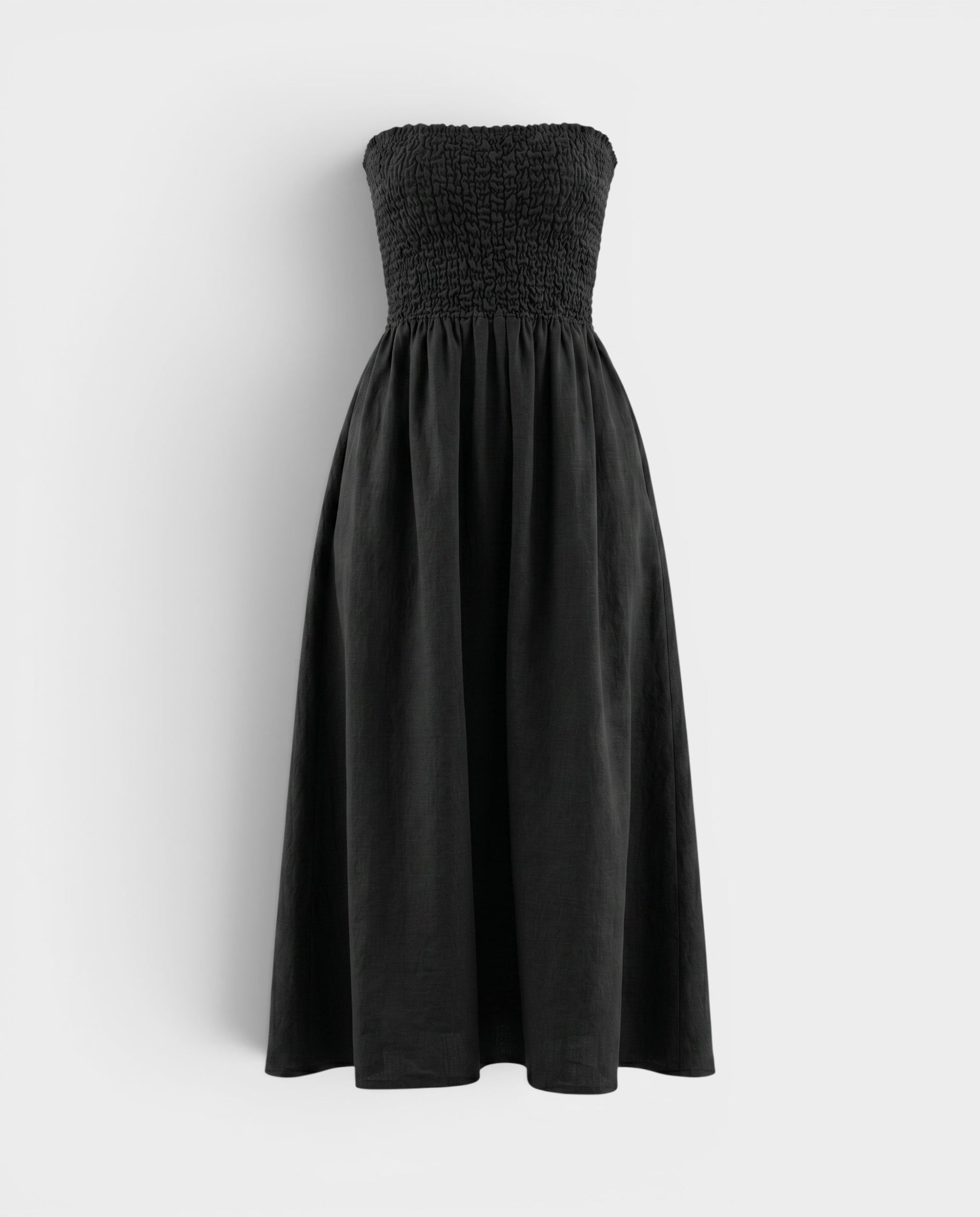 JONES + CO black strapless midi dress with a smocked bodice and relaxed skirt in stretch-cotton fabric.