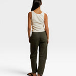JONES + CO Blondie bright ivory ribbed tank top worn with olive green trousers, back view