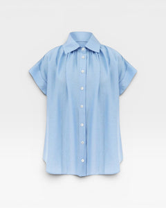 JONES + CO blue brushed cotton Trinity button top with relaxed drape and open collar.