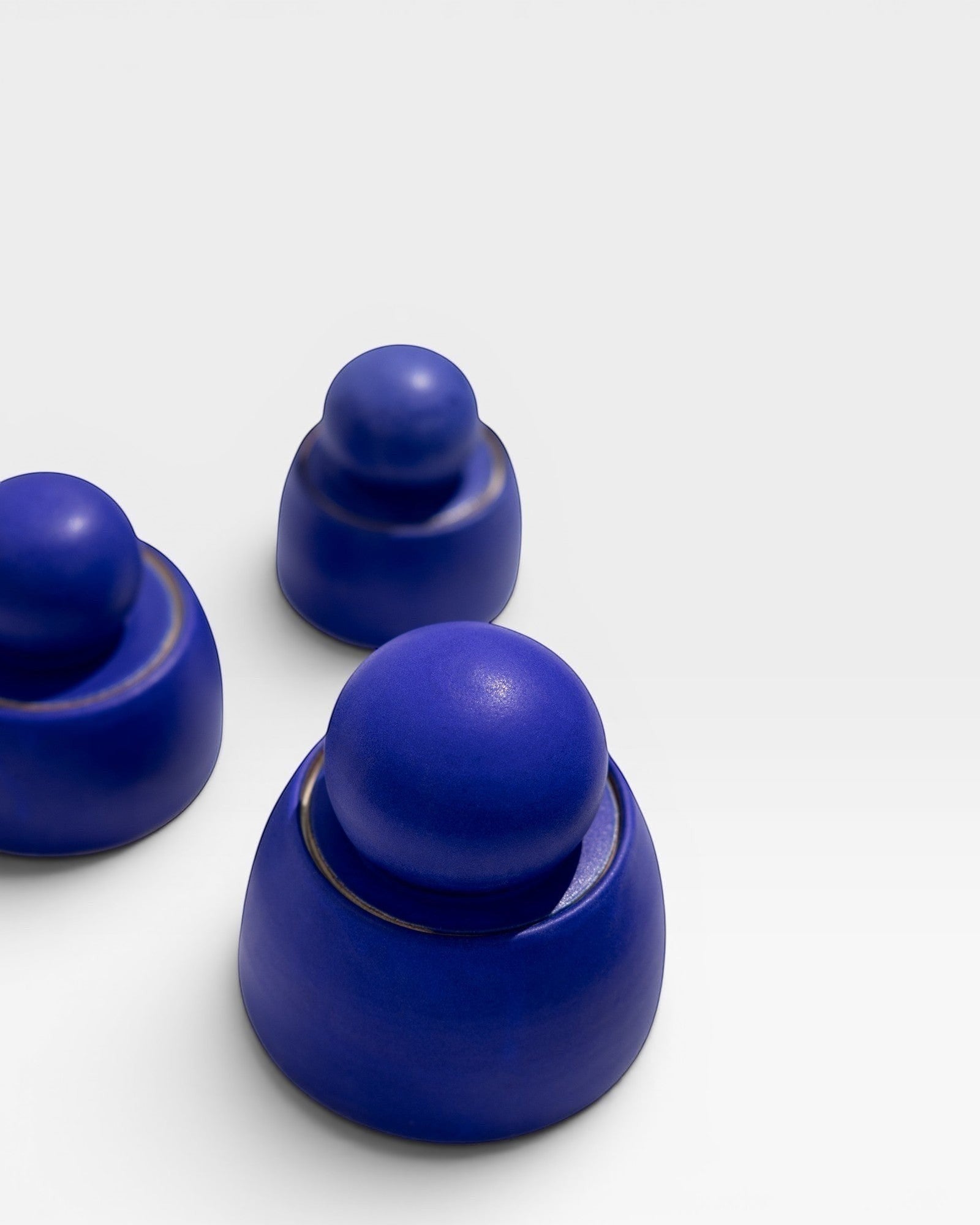 JONES + CO electric blue stoneware stash jars with sculptural knobs, handmade in Los Angeles.