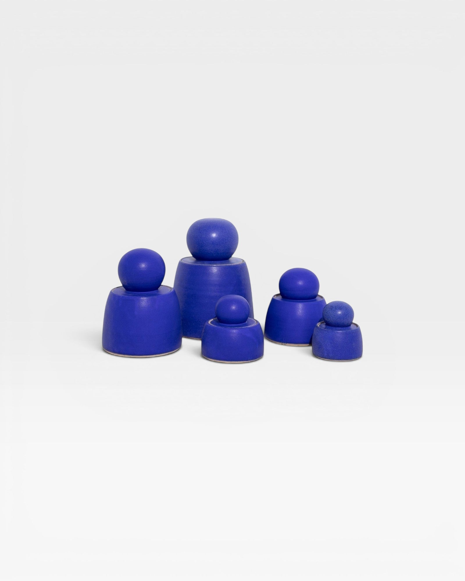 JONES + CO electric blue stoneware stash jars with sculptural knobs, handmade in Los Angeles.