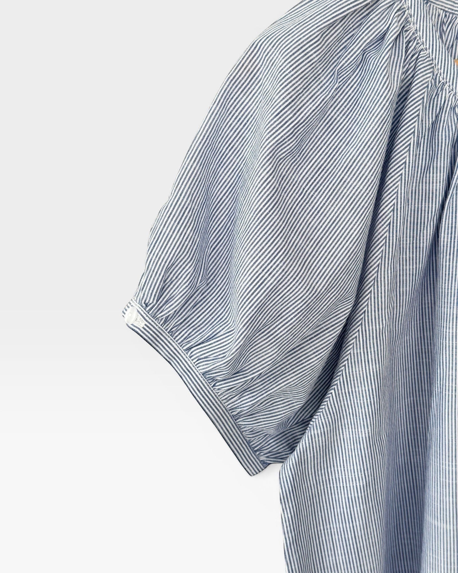 JONES + CO blue and white striped cotton short sleeve top with puff sleeves and shirring detail.