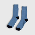 JONES + CO bluebell blue cashmere blend socks with wide ribbing and contrasting dark heel and toe details.