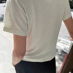 JONES + CO Bo Linen Blend Tee in Salt. Relaxed fit, crew neck, short sleeves, textured, sheer fabric.