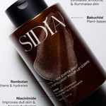 JONES + CO The Body Exfoliant WIRED in a brown bottle with a black cap, featuring rice exfoliants.