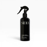 JONES + CO The Body Serum WIRED in black spray bottle with tea leaves and eucalyptus scent. Lightweight, fast-absorbing formula.