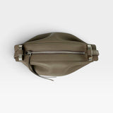 JONES + CO Bon-Bon taupe bovine leather handbag with silver metal clasp and zipper closure, top view.