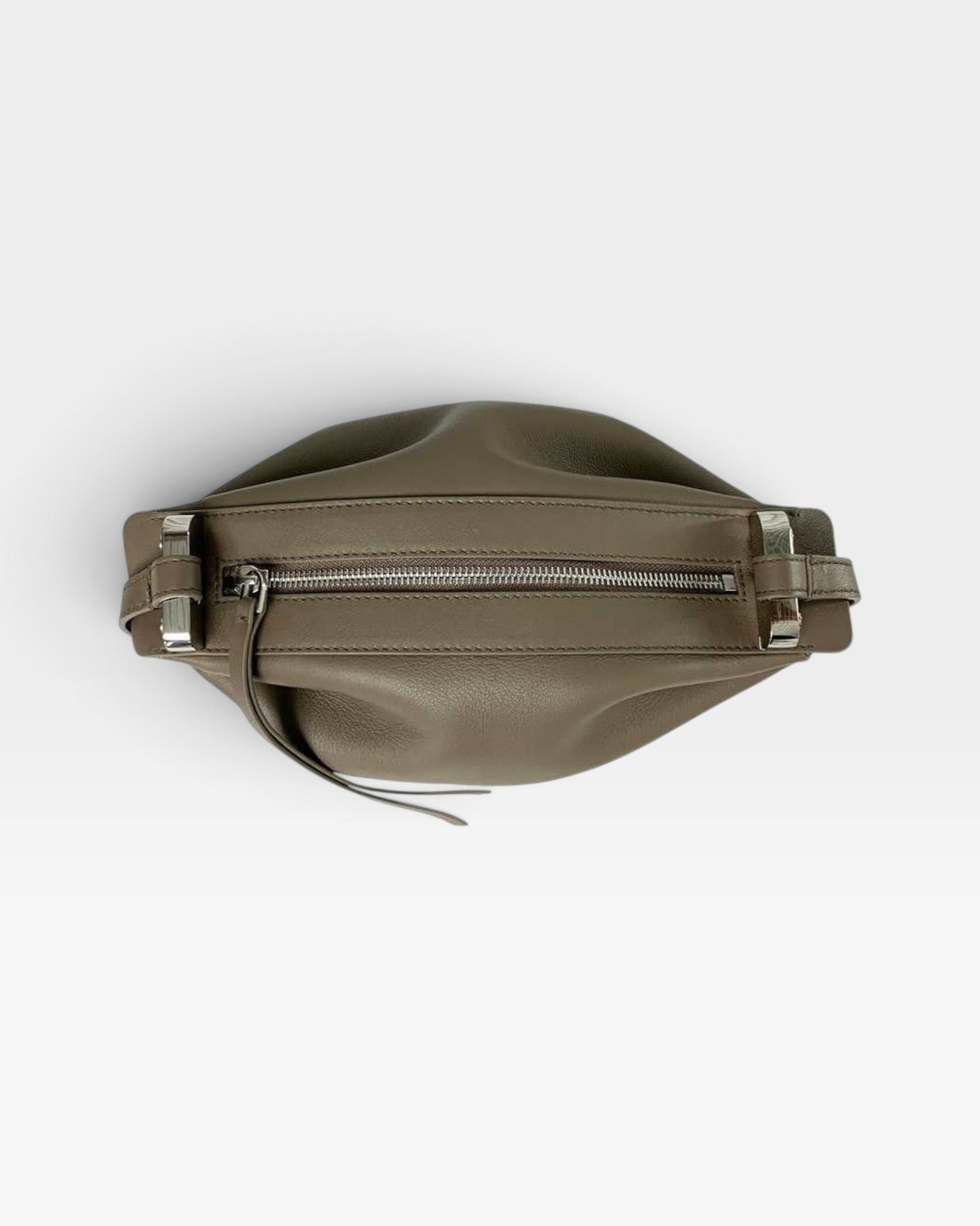 JONES + CO Bon-Bon taupe bovine leather handbag with silver metal clasp and zipper closure, top view.