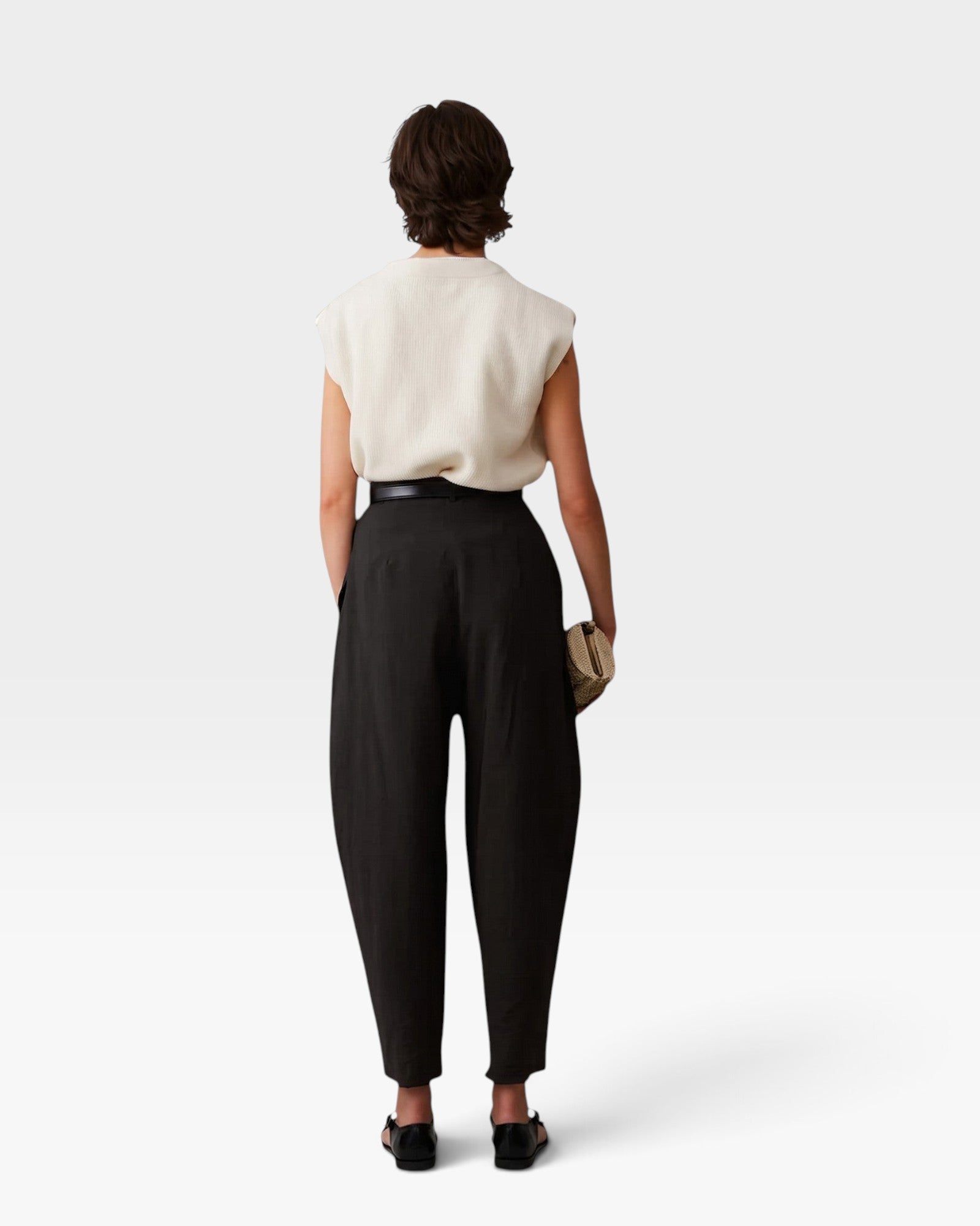 JONES + CO black wool Brady trousers with a high-waisted, tapered, and cropped silhouette, back view.