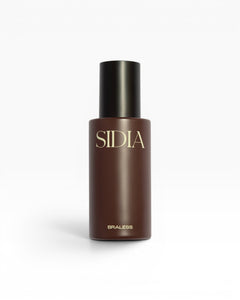 JONES + CO BRALESS body mist in a dark brown bottle with a black cap and gold lettering.