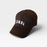JONES + CO brown baseball cap with white inverted text embroidery on the front panel