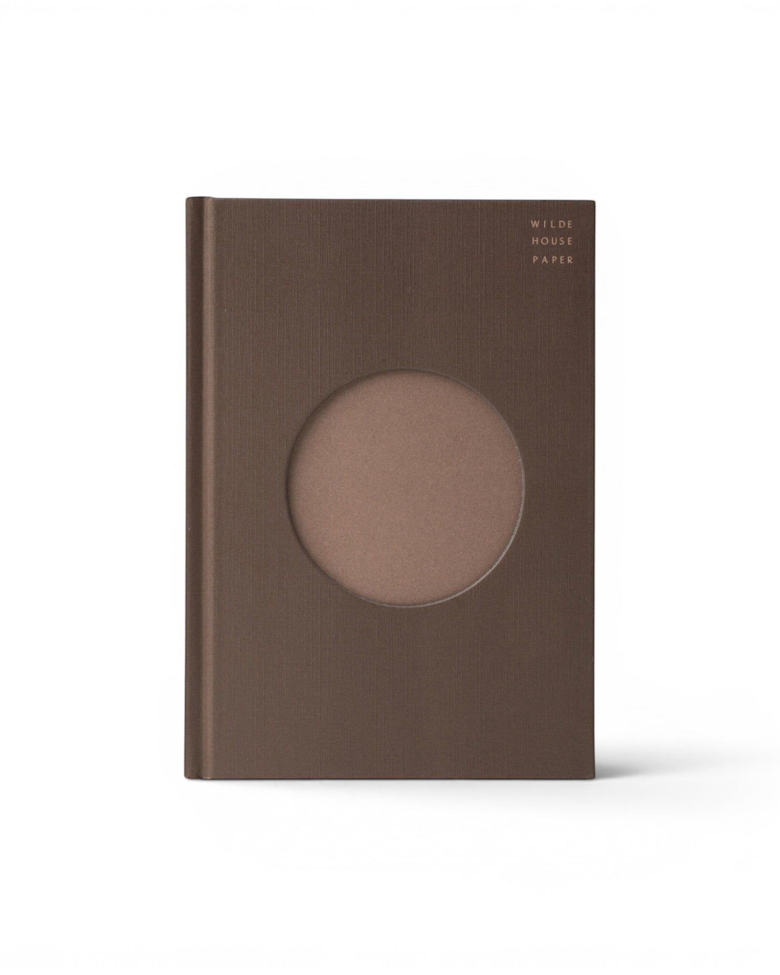 JONES + CO brown lined Open Journal with a circular cutout on the textured hard cover