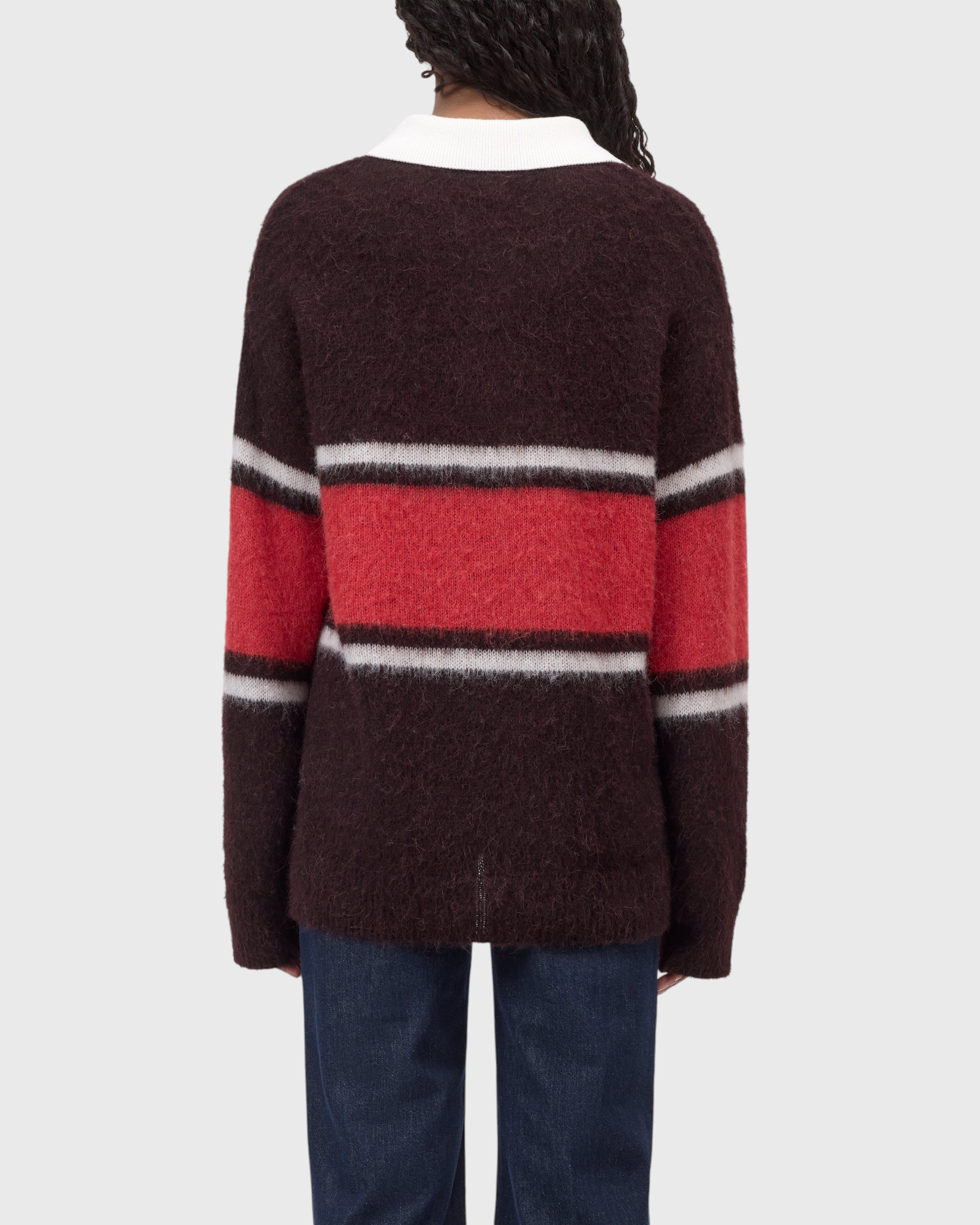 JONES + CO relaxed fit alpaca-wool blend polo jumper in cinder brown with red and white rugby stripes, back view.