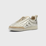 JONES + CO Bubble Ollo sneaker in metallic champagne lambskin leather with a suede toe and translucent bubble sole.