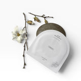 JONES + CO Calm Movements hydrogel eye & cheek mask packaging with a minimalist design, featuring soothing ingredients.