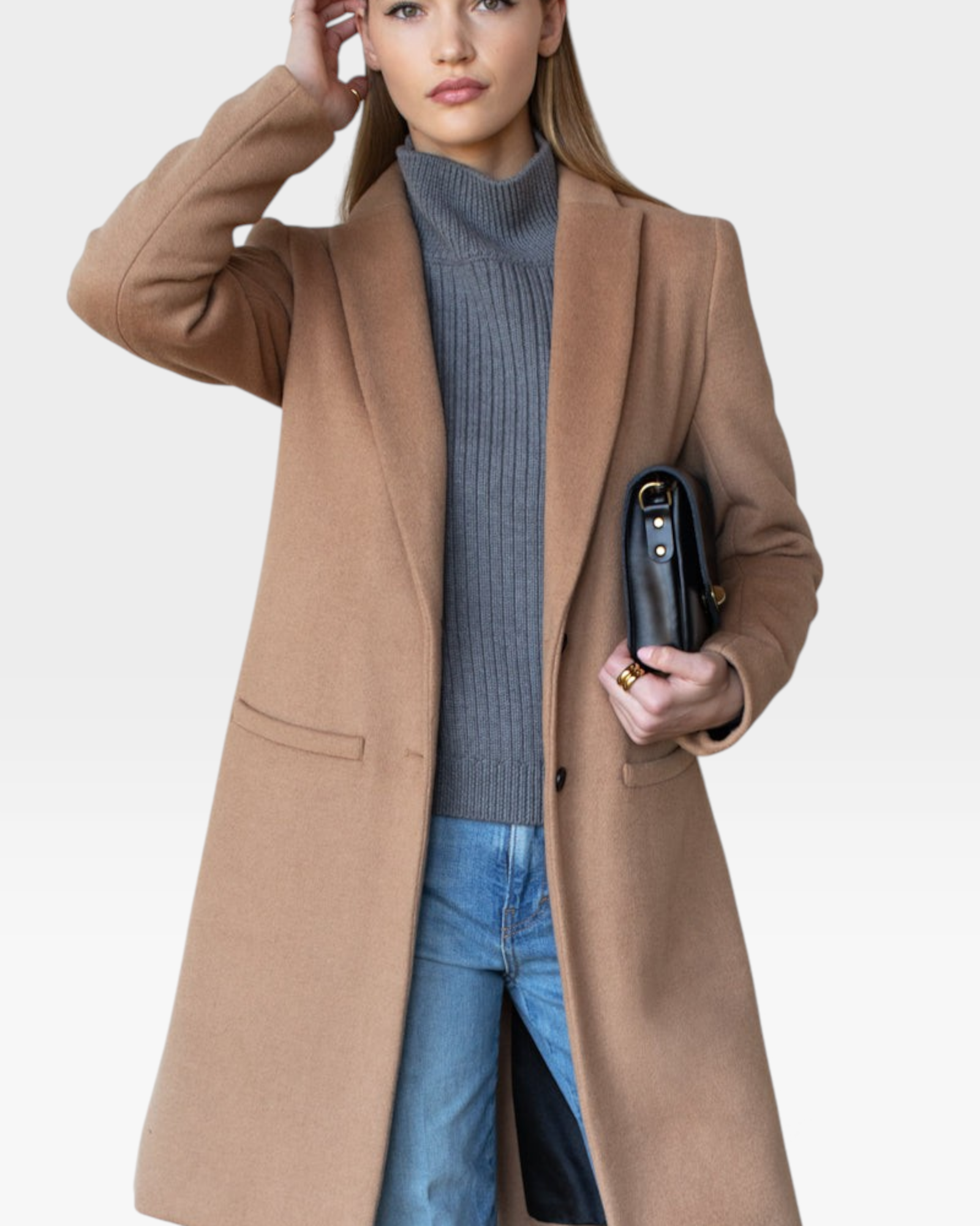 JONES + CO camel wool cashmere tailored coat with notch collar worn by a model with a grey sweater and blue jeans