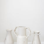 JONES + CO cream speckled ceramic bulb vase with twisted handles, handmade by Bettina Chow.