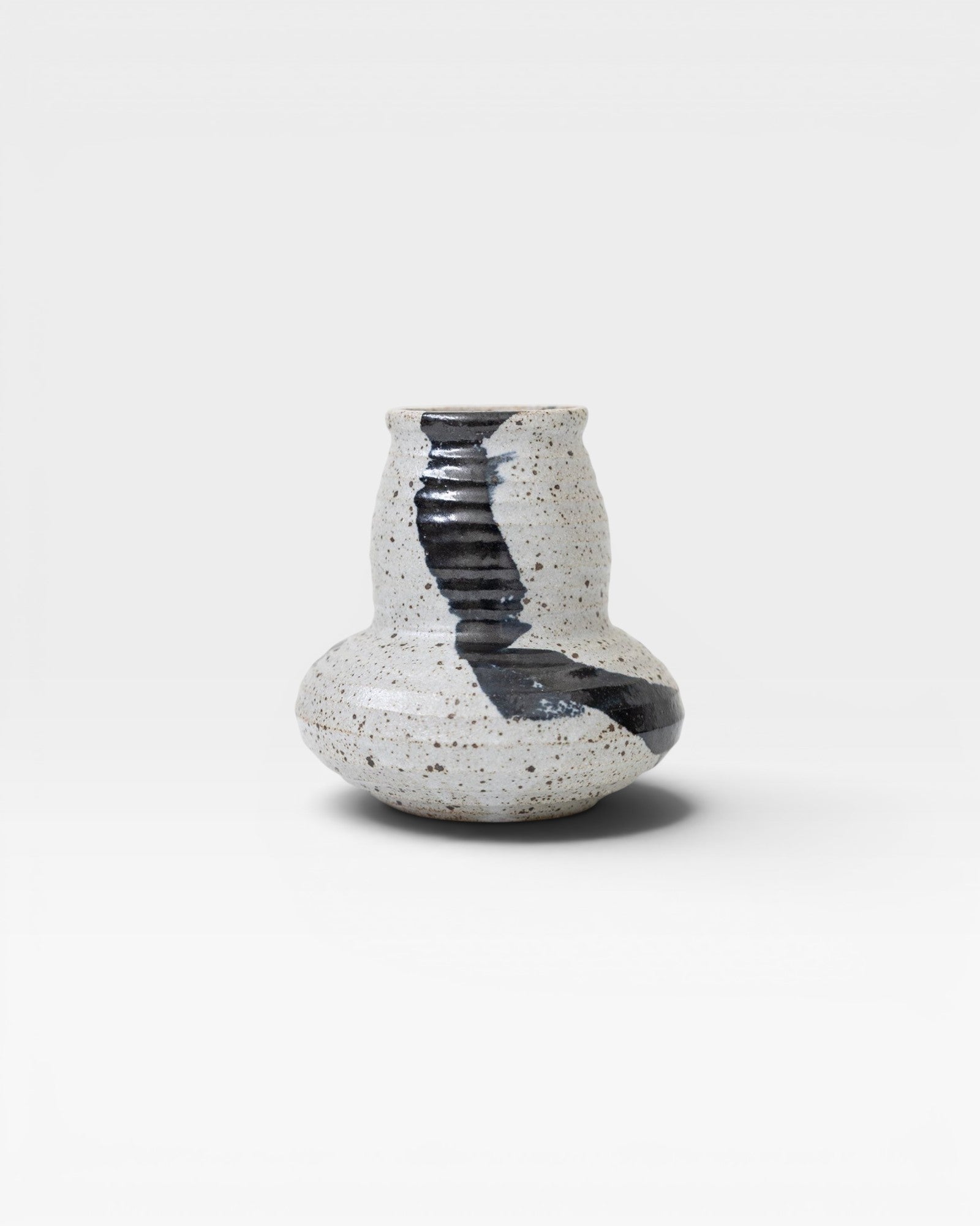 JONES + CO speckled ceramic vase with bold black brushstroke detail, handmade by Nishi.