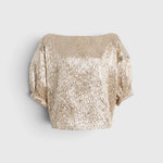 JONES + CO Filly Top in champagne shimmery textured silk with boat neckline and sculptural puff sleeves.