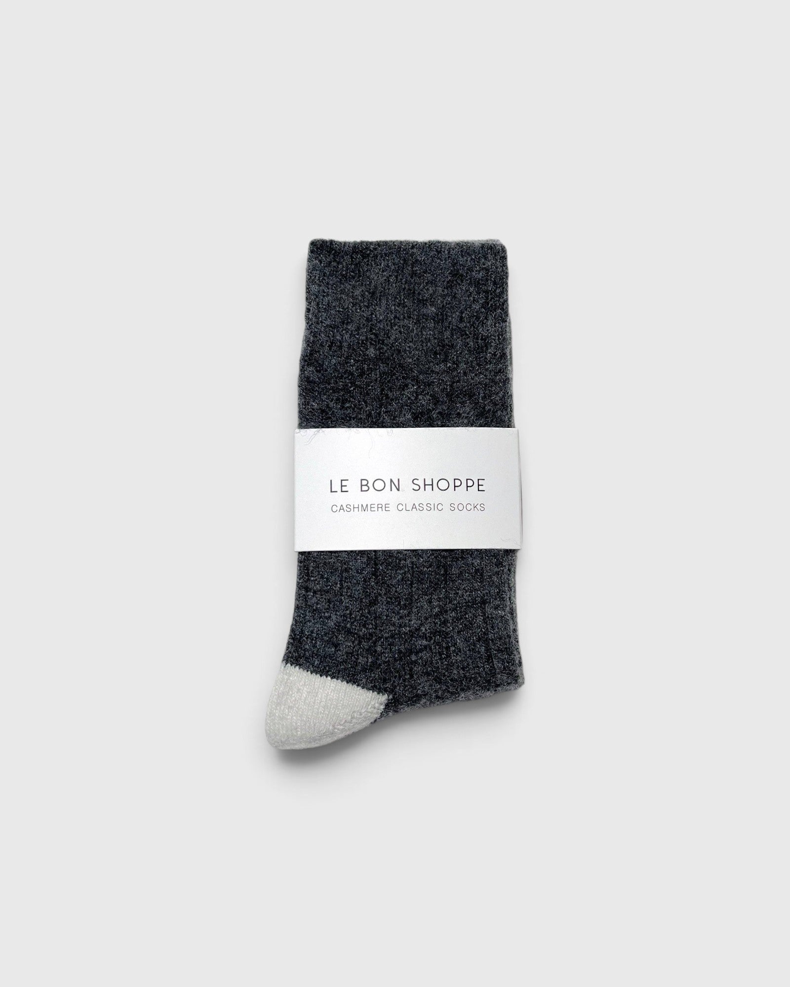 JONES + CO charcoal melange cashmere blend socks with wide ribbing and a contrasting light grey toe detail.