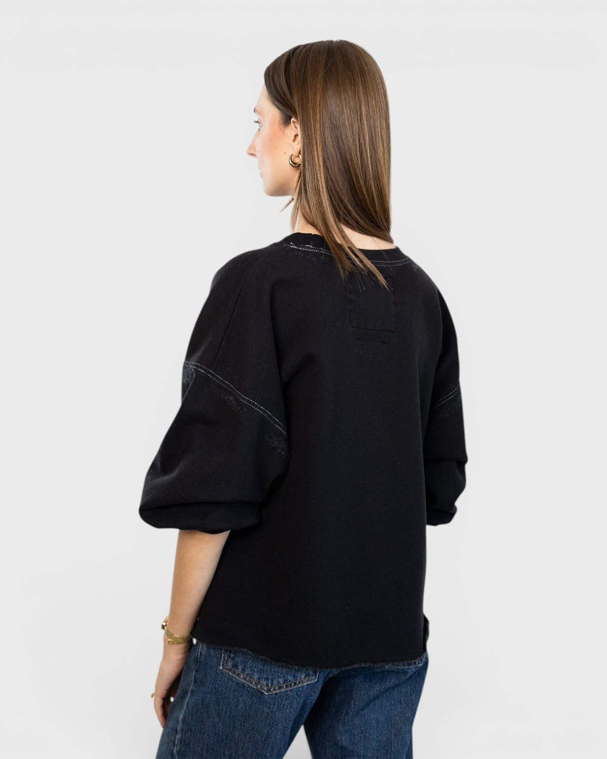JONES + CO Rachel Comey charcoal Fond sweatshirt with drop shoulders and raw edge hem seen from the back