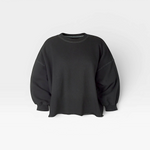 JONES + CO charcoal Fond crewneck sweatshirt with drop shoulders, cropped sleeves, and a raw edge hemline.