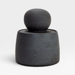 JONES + CO matte charcoal stoneware stash jar with a large chunky knob and glossy black interior. Hand-thrown, unique piece.