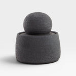 JONES + CO matte charcoal stoneware stash jar with a large chunky knob. Hand-thrown, textured exterior, glossy interior.