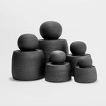 JONES + CO matte charcoal stoneware stash jars with chunky knobs. Hand-thrown, unique, and perfect for organization.