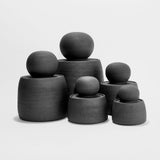 JONES + CO matte charcoal stoneware stash jars with chunky knobs. Hand-thrown, unique, and perfect for organization.