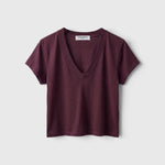 JONES + CO Alanis V neck tee in cherry lacquer recycled cotton with a relaxed cropped fit and deep neckline.