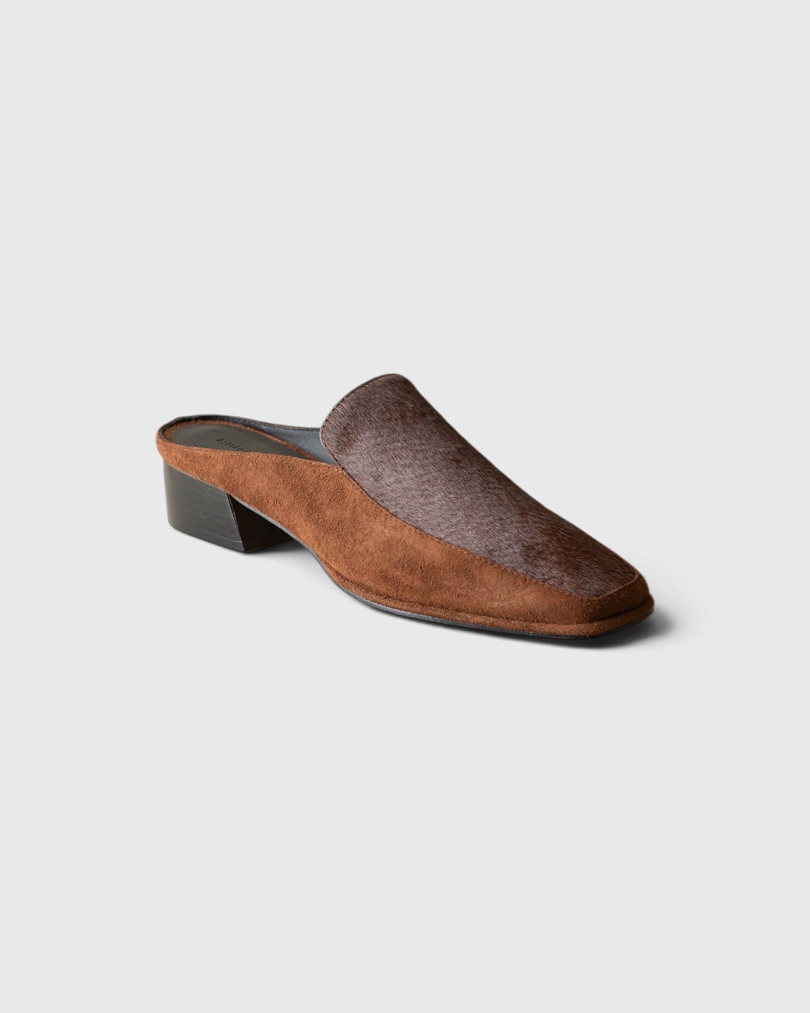 JONES + CO Felix chocolate calf hair loafer mule with a square toe and sculpted leather-wrapped wood heel.