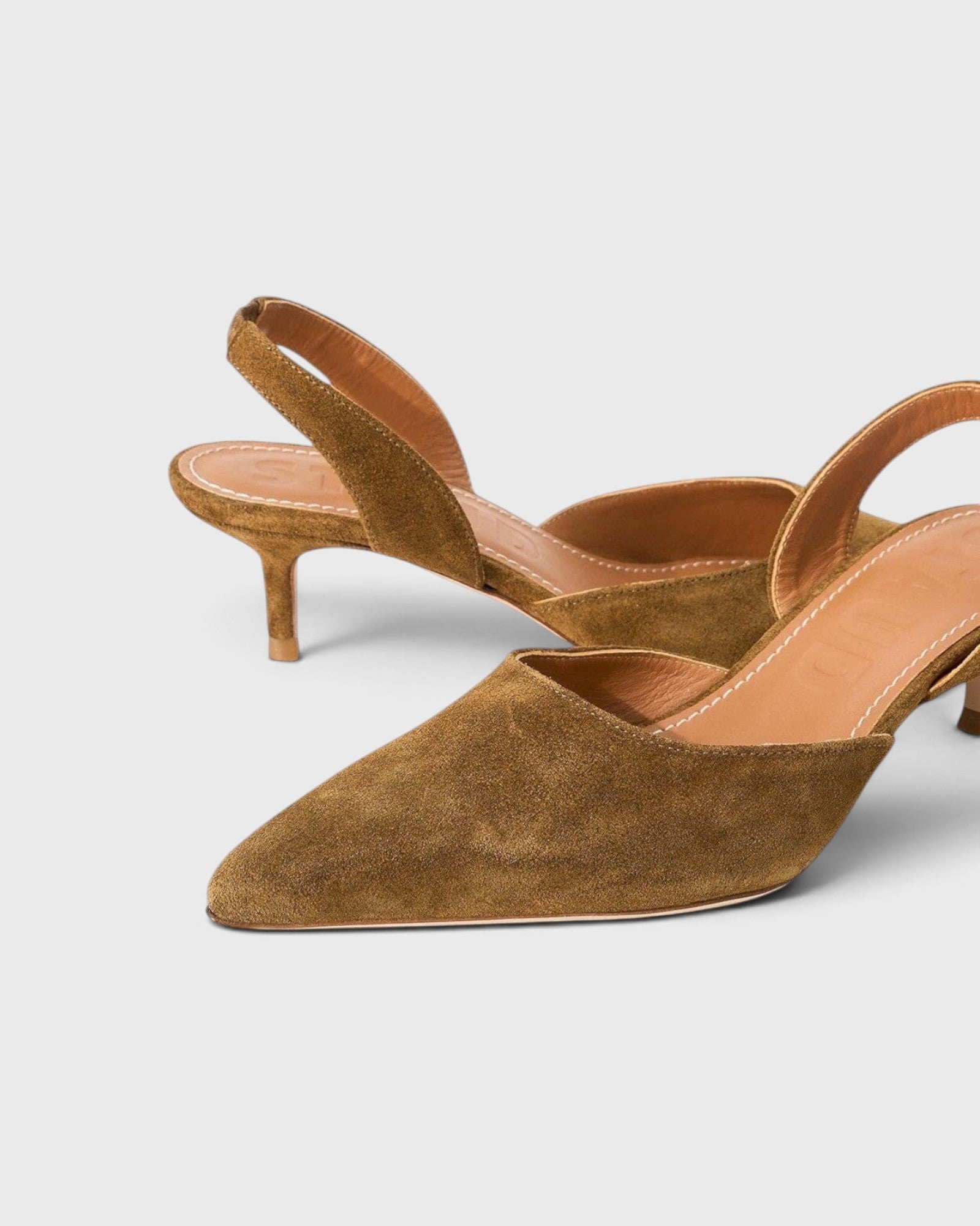 JONES + CO Sebastian slingback heels in cigar brown suede with a pointed toe and slim kitten heel.