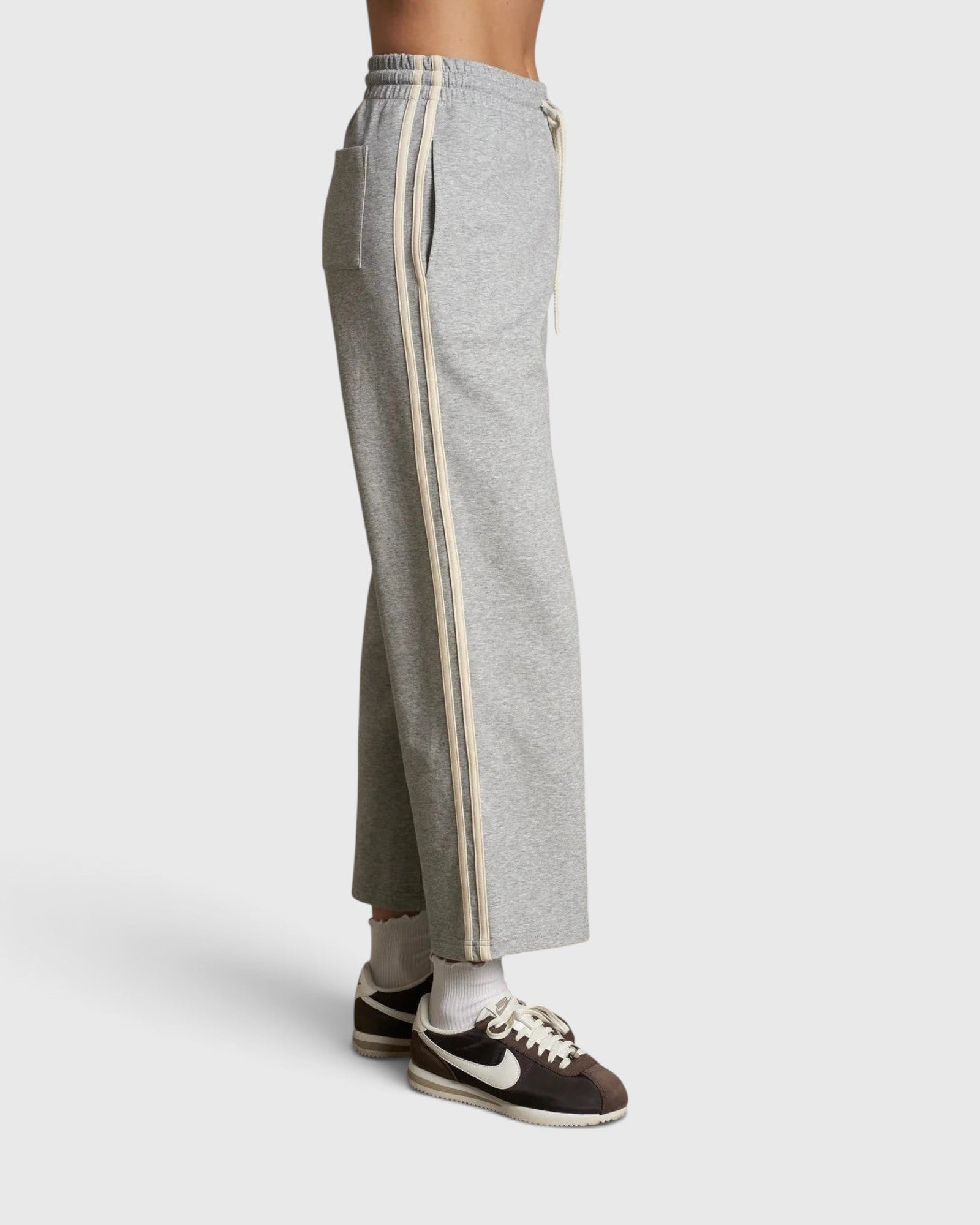 JONES + CO Claud heather grey cotton fleece track pants with ivory side stripes and drawstring waist, side view