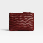 JONES + CO Cleo Pouch in woven burgundy leather. Small zip pouch for essentials.