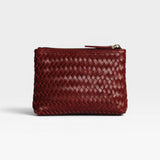 JONES + CO Cleo Pouch in woven burgundy leather. Small zip pouch for essentials.