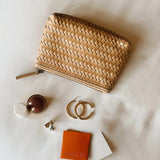 JONES + CO Cleo Pouch in woven tan leather. Zip closure. Perfect for organizing essentials.