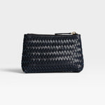 JONES + CO Cleo Pouch: small dark navy woven leather zip pouch for organizing essentials.