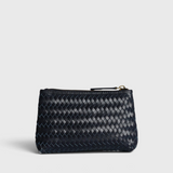 JONES + CO Cleo Pouch: small dark navy woven leather zip pouch for organizing essentials.