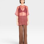 JONES + CO Cocoa silk wide-leg pants with a relaxed fit and high waist. Model wears size S.